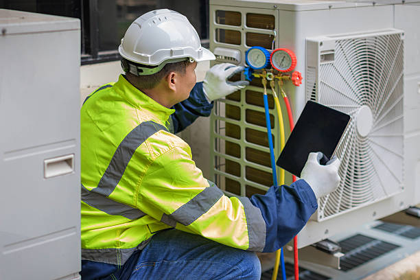 Professional Hvac technician working in Beasley, TX